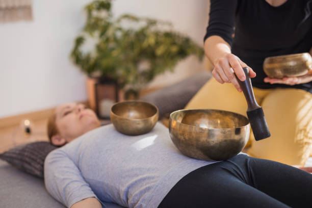 istock Therapist using Tibetan singing bowls in therapy 2035378168
