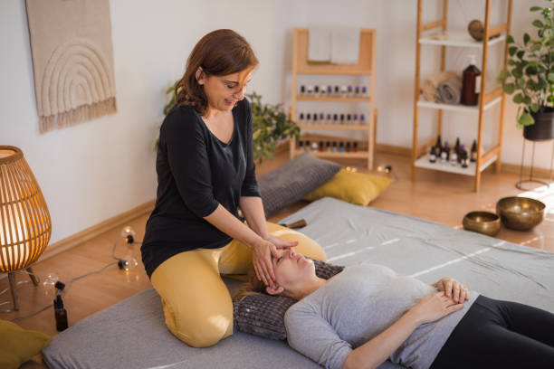 istock Woman having her forehead massaged 2035381456