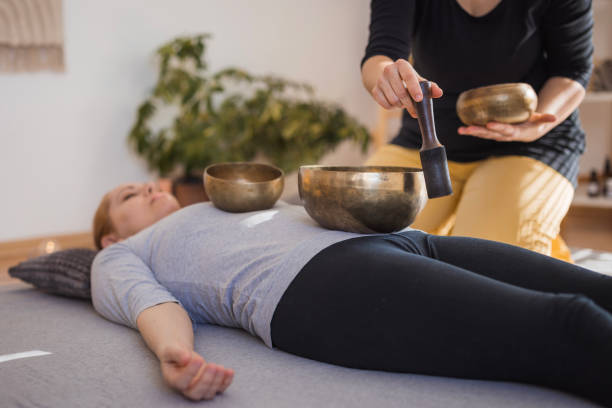 istock Therapist using Tibetan singing bowls in therapy 2035381466