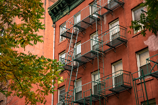 Cropped shot of fire escapes in an old building in New York City