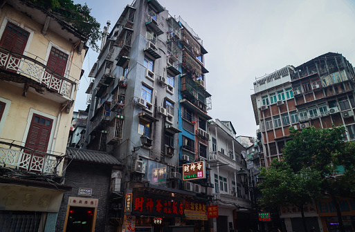 Macao, China - May 12, 2023: A group of adjacent buildings in Macau, showcasing the citys urban landscape.