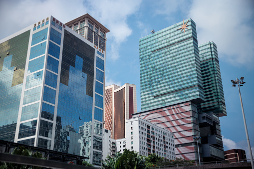Macao, China - May 12, 2023: A collection of towering buildings standing side by side in the bustling city of Macau.