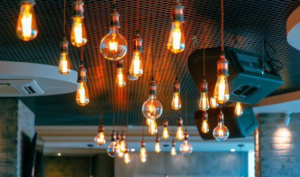 istock Decorative antique edison style filament light bulbs hanging from ceiling 2035426321