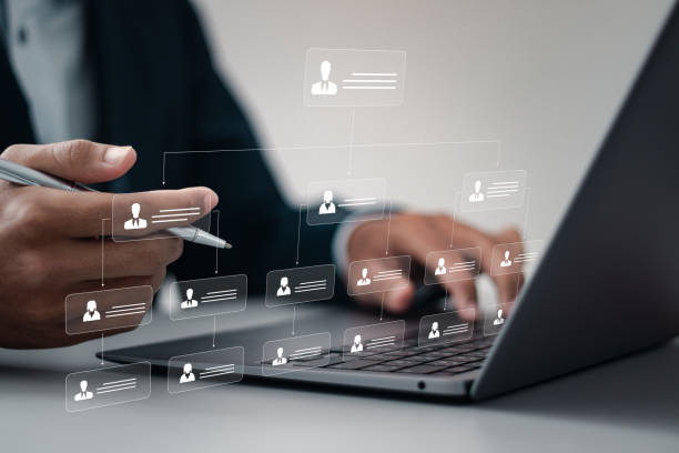 istock Business workflow process management. businessman use laptop with workflow automation system with data diagram of hierarchical structure of departments in business organization. digital transformation 2035440291