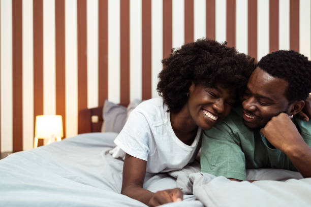 istock A happy Black couple lying in bed 2035473194