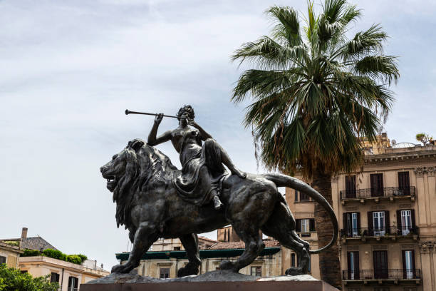 Ascending the grand stone stairs of Pretoria fountain, surrounded by classical statues and the stunning Palermo skyline, one is transported to a bygone era of opulence and architectural marvels in Italy