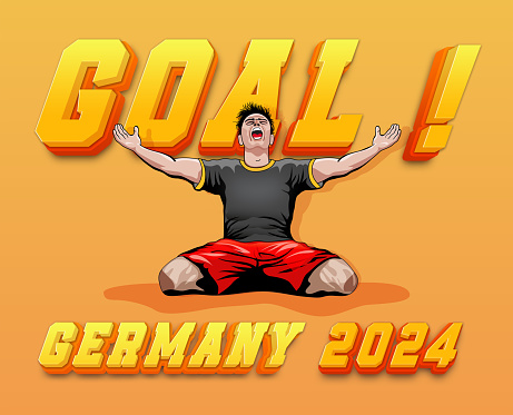 German soccer player celebrating goal sitting on the floor