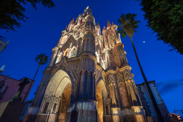 The facade of the iconic Parroquia De San Miguel Arcangel Cathedral in the center of the city.