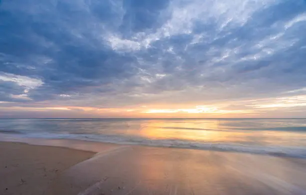 Photo of Beautiful sunset at famous Natai beach in Phang nga, southern part of thailand close to Phuket.