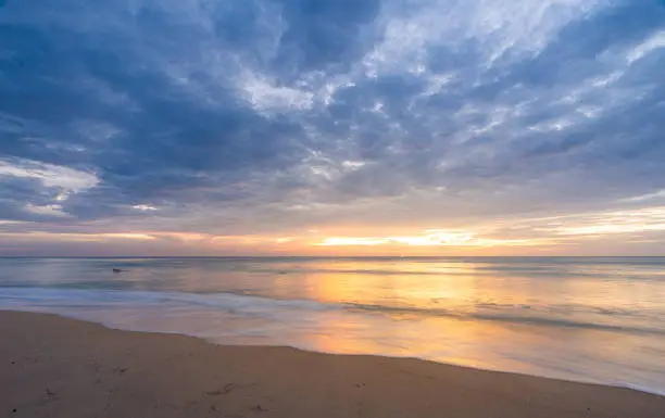 Photo of Beautiful sunset at famous Natai beach in Phang nga, southern part of thailand close to Phuket.