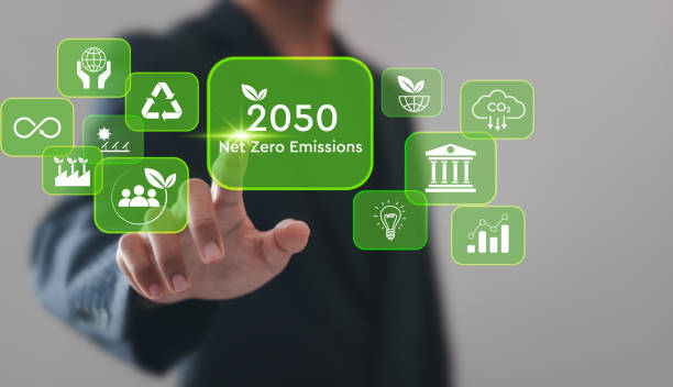 istock Net zero emissions by 2050. Businessman touching virtual Net Zero icons to change climate and net zero greenhouse gas emissions target. Sustainable development and green business concept. 2035516654