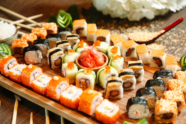 istock Wooden Tray With Sushi and Chopsticks 2035547202