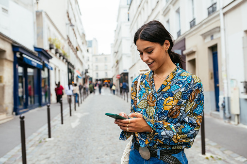 Beautiful millennial woman in Paris