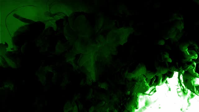 Green ink or other fluid cloud spreading and rising on white surface. Motion graphic animation