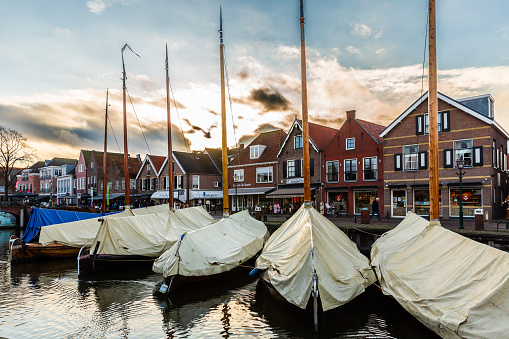 Bunschoten-Spakenburg, The Netherlands - February 24th, 2024: Classic fishing boats in the old harbour of Spakenburg, Netherlands