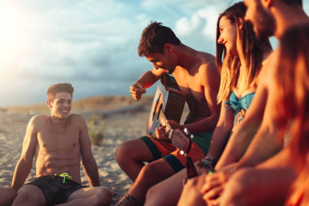 istock Young friends party on the beach: summer vibes 2035762216