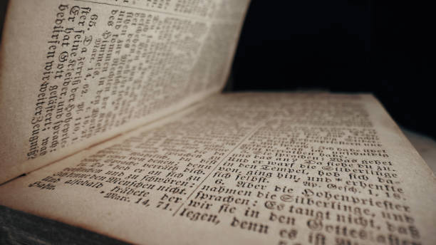 istock Exploring sacred christians heritage scriptures on german. Details of the Holy Bible. Tradition and wisdom, macro. Letters and symbols. 2035806985