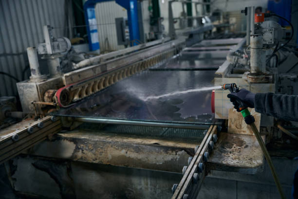 istock Washing glass in window production 2035857222