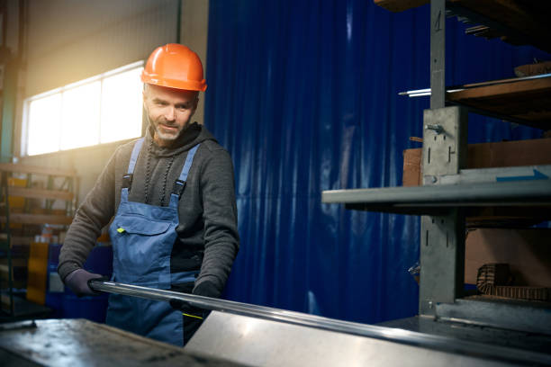 istock Worker uses modern equipment in a window production 2035858327