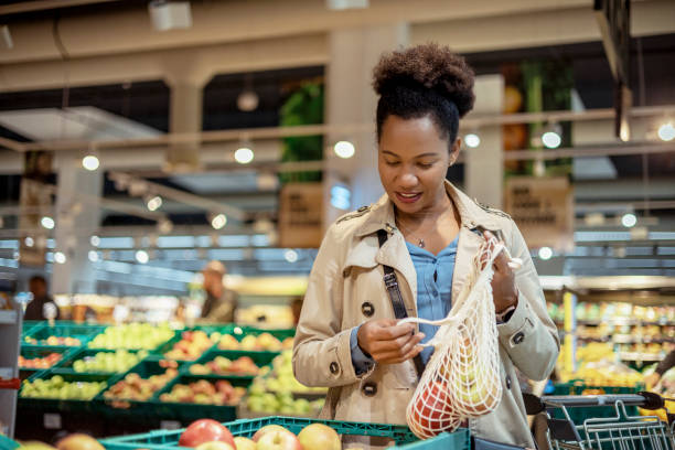 istock Woman Taking Groceries at Reusable Bag 2035937001