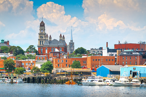 Gloucester, Massachusetts, USA downtown city skyline on the harbor.