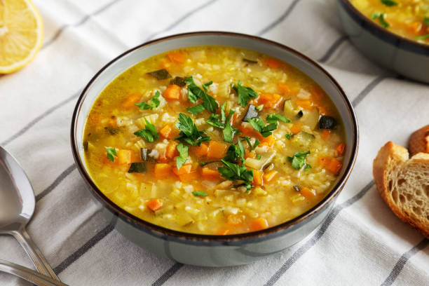 istock Homemade lemon rice soup in a bowl, side view. 2035965941