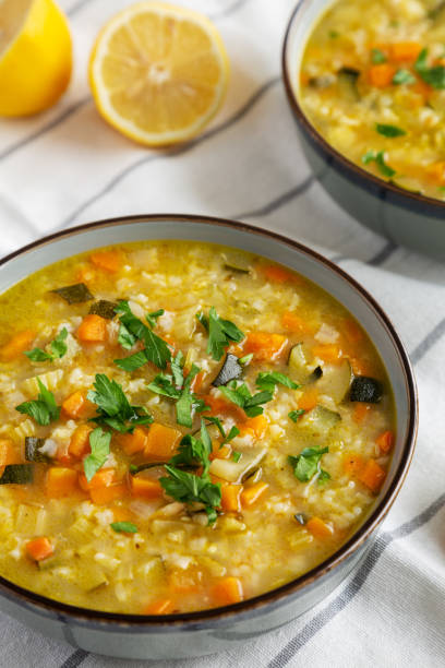 istock Homemade fresh lemon rice soup in a bowl, side view. 2035968606