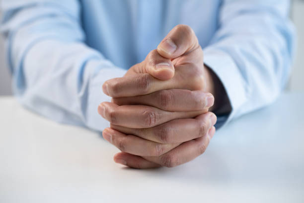 istock Nervous, anxious and worried man fidget with finger feeling stress 2036062129