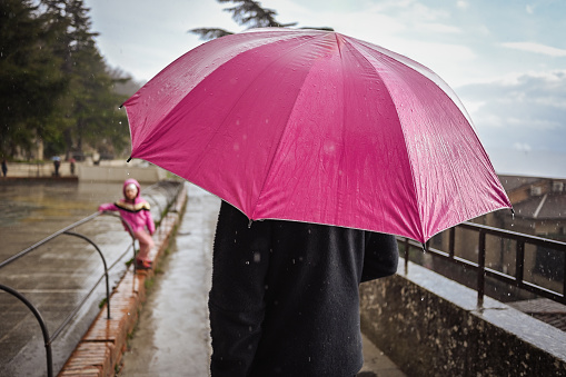 Family in a rainy day.