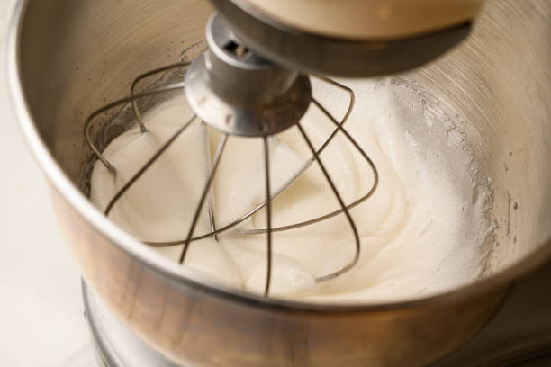 istock Whipped cream in a stand mixer with a whipping attachment 2036126091