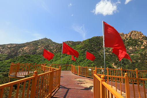 The red flag is on a wooden trestle in a reserve Park, North China