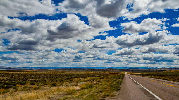istock Rain clouds during the day over the plains in Utah, US 2036403299
