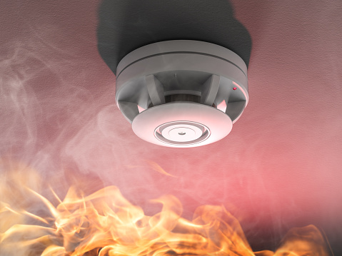 3d rendering smoke detector on ceiling activate by smoke
