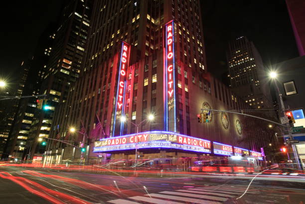 Street view of Radio City Music Hall at night in New York City