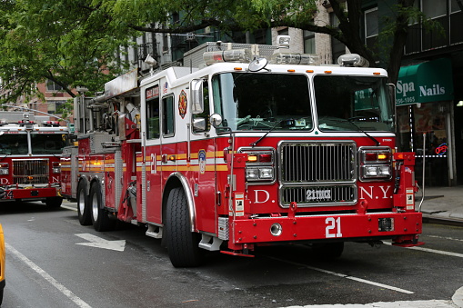 Firefighters rushing through Midtown Manhattan, New York