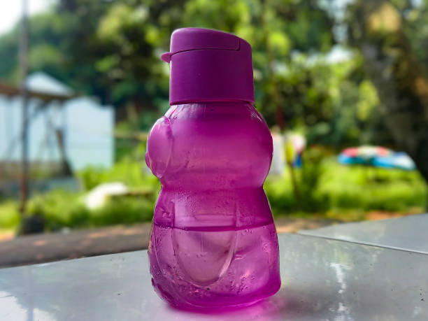 Mineral water in a tupperware bottle