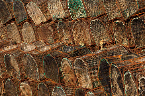 Fishing traps stored in a port in Asturias, Spain.