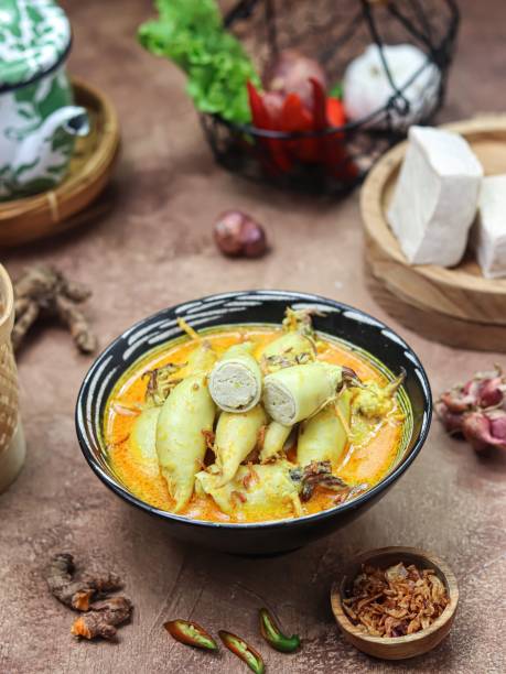 istock Gulai cumi isi tahu, or squid curry stuffed with egg and  tofu 2036728724