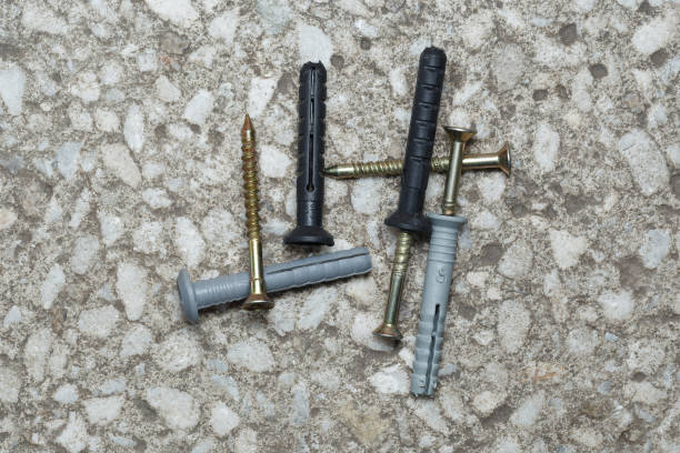 istock Gray and black dowel nails, top view 2036945006