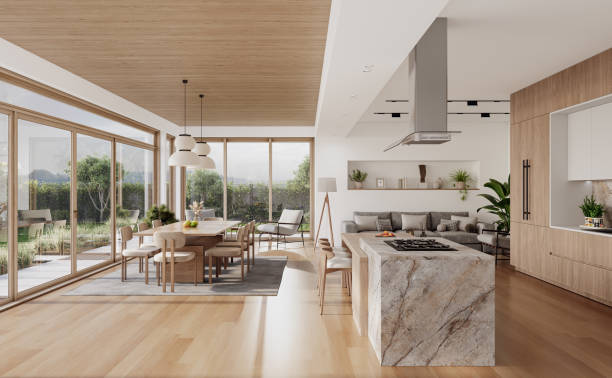 istock Open space living room and kitchen interior with large windows, gray sofa, dining table and hardwood flooring. Modern design solution 2037012334