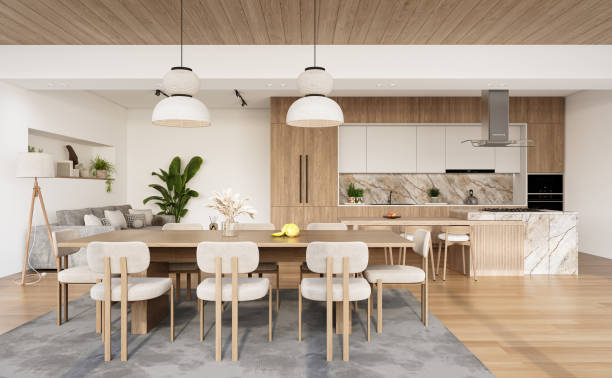 istock Open space living room and kitchen interior with large windows, gray sofa, dining table and hardwood flooring. Modern design solution 2037012347