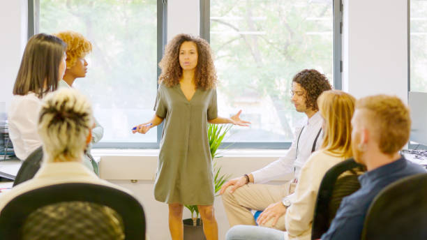 istock Female manager scolding employees in a coworking space 2037043679