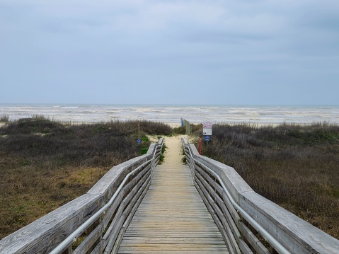 Beach Boardwalk And Beach Homes On Galveston Texas Coastline