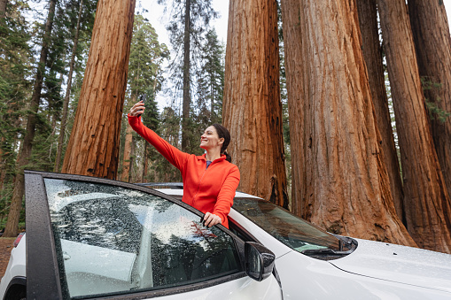 Woman taking selfie in Sequoia National Park