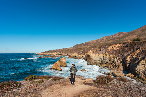 Woman Hiker on the Pacific Coast in California