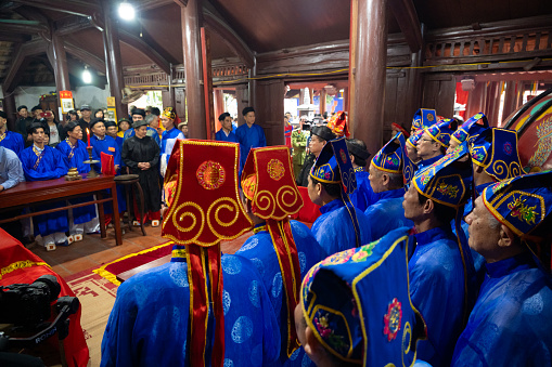 Bac Ninh, Vietnam 02,25,2024 The men wear traditional costumes like the mandarins of the past