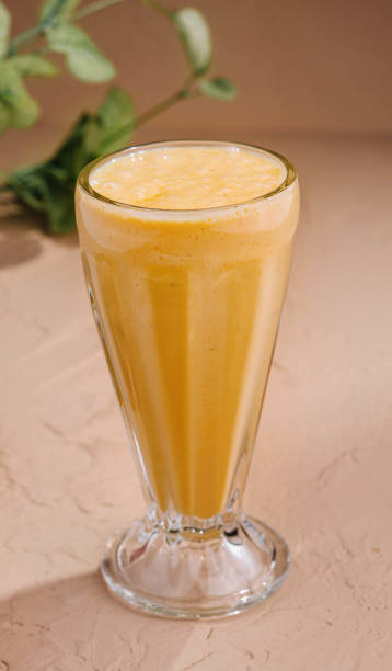 istock Tasty banana smoothie or milkshake 2037136773