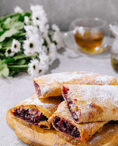 istock flaky puff pastries, filled with sweet cherry filling 2037174576