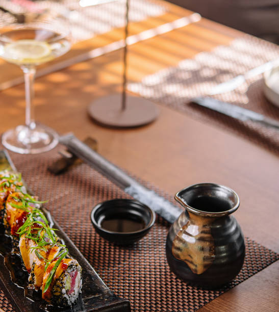 istock Japanese unagi eel grilled sushi maki roll cutting 2037175095