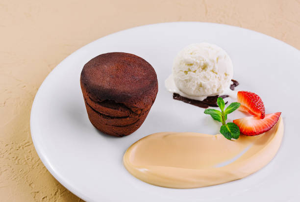 istock White plate with chocolate fondant cake 2037184005